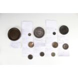 11 James I bronze trade weights, 3 cm, 13 g to 12.5 cm, 848 g