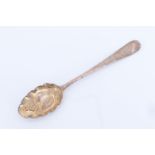 Hester Bateman, a George III and later silver berry spoon, the bowl repouse decorated with fruit and