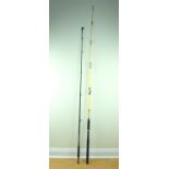 A Shakespeare "Euroboat" 1.95 m 20 lbs boat fishing rod, together with a Daiwa 7 ft 20 - 30 lbs boat