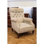 A Victorian upholstered mahogany lounge armchair