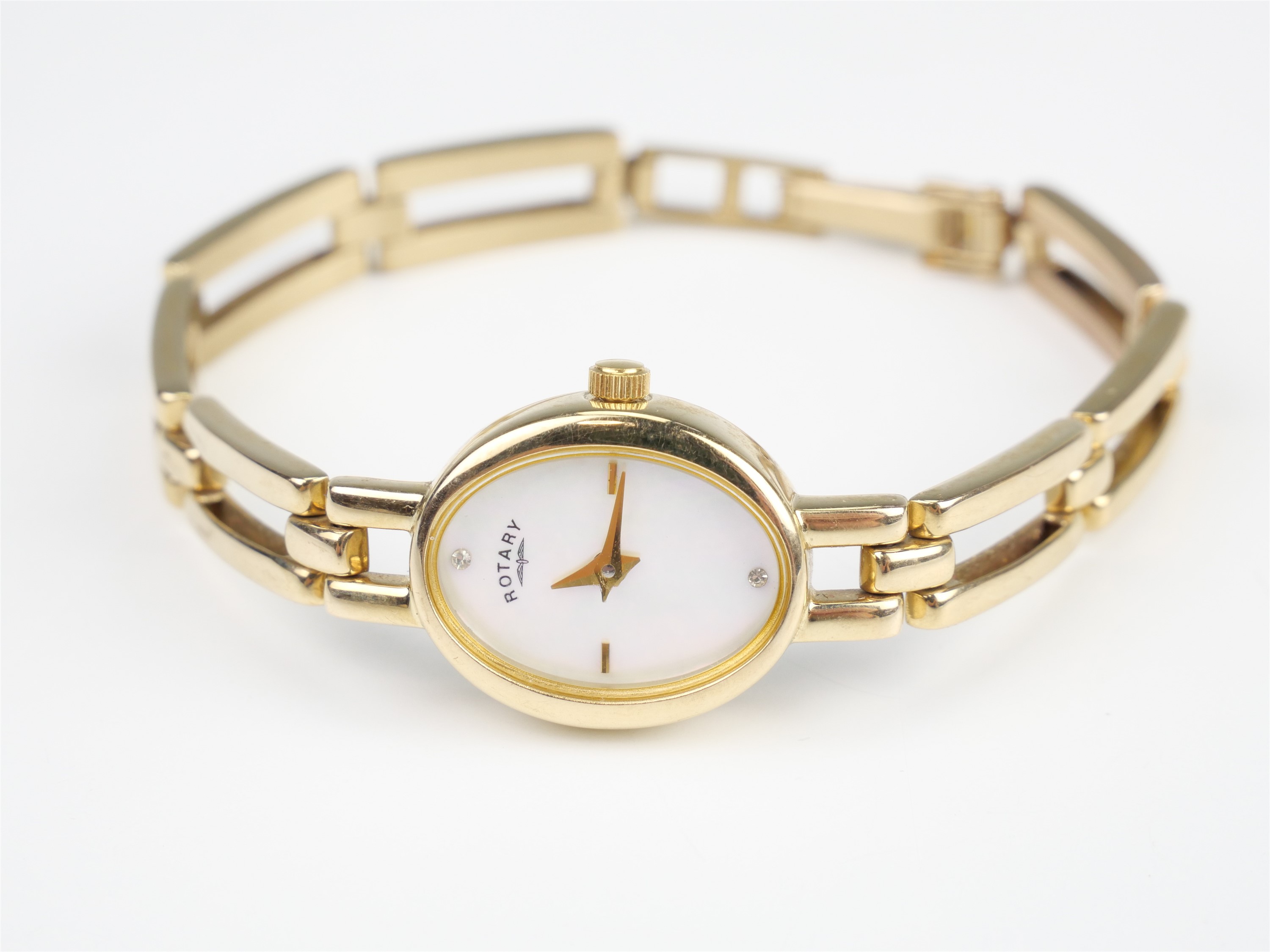 A contemporary lady's Rotary 9 ct gold dress watch, having a quartz movement with mother-of-pearl