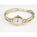 A contemporary lady's Rotary 9 ct gold dress watch, having a quartz movement with mother-of-pearl