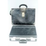 A 1960s / 1970s pigskin briefcase, together with a "Custom" hard shell briefcase