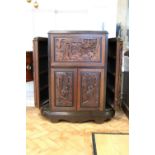 A mid-20th Century Chinese carved hardwood drinks cabinet, 89 cm x 48 cm x 104 cm high