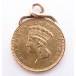 An 1873 US "Indian Head" one dollar gold coin pendant, 15 mm excluding suspender, 2.0 g