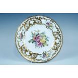 A 1904 Royal Crown Derby hand enamelled floral pattern plate, raised gilt decorated, 25.5 cm