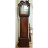 A Georgian walnut long case clock by William Alexander of Hexham, having a 30-hour movement and