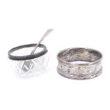 A late 20th Century silver napkin ring, engraved with a band of ivy leaves and 'Peter',