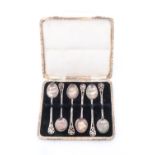 A cased set of teaspoons, the terminals pierced and engraved with acanthus leaves, Birmingham, 1928,
