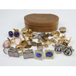 A quantity of late 20th Century cufflinks and shirt studs, in a vintage leather 'studs' case