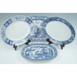 Two 19th Century transfer decorated blue and white Willow pattern ashets, and two others, largest 35