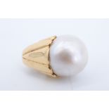 A large pearl and high carat yellow metal pendant, pearl approx 14 mm, 24 mm drop, 8.5 g
