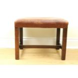 A George III hide-upholstered mahogany stool, 55 cm x 40 cm x 33 cm