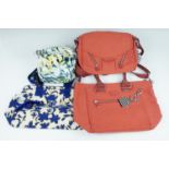 Four Kipling bags, comprising of two shoulder bags, a red handbag and patterned cross body bag