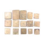 Fifteen 18th Century and later square brass coin weights, to weigh in pennies and grains,