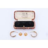 A 9 ct gold shirt stud, a yellow metal shirt stud marked 18 ct, and a pair of 9 ct gold earrings, in