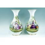 A pair of Victorian large porcelain pronounced baluster vases, having flared necks and hand