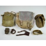 A British army 1918 dated Webbing Lewis machine gun magazine pouch, a Sam Browne sword frog, a