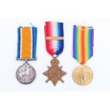 A 1914 Star with clasp, British War and Victory medals to 3-10403 Pte J Skarratt, 1 Northamptonshire