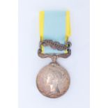 A Crimea Medal with Sebastopol clasp impressed to J Judson, 34th Regt