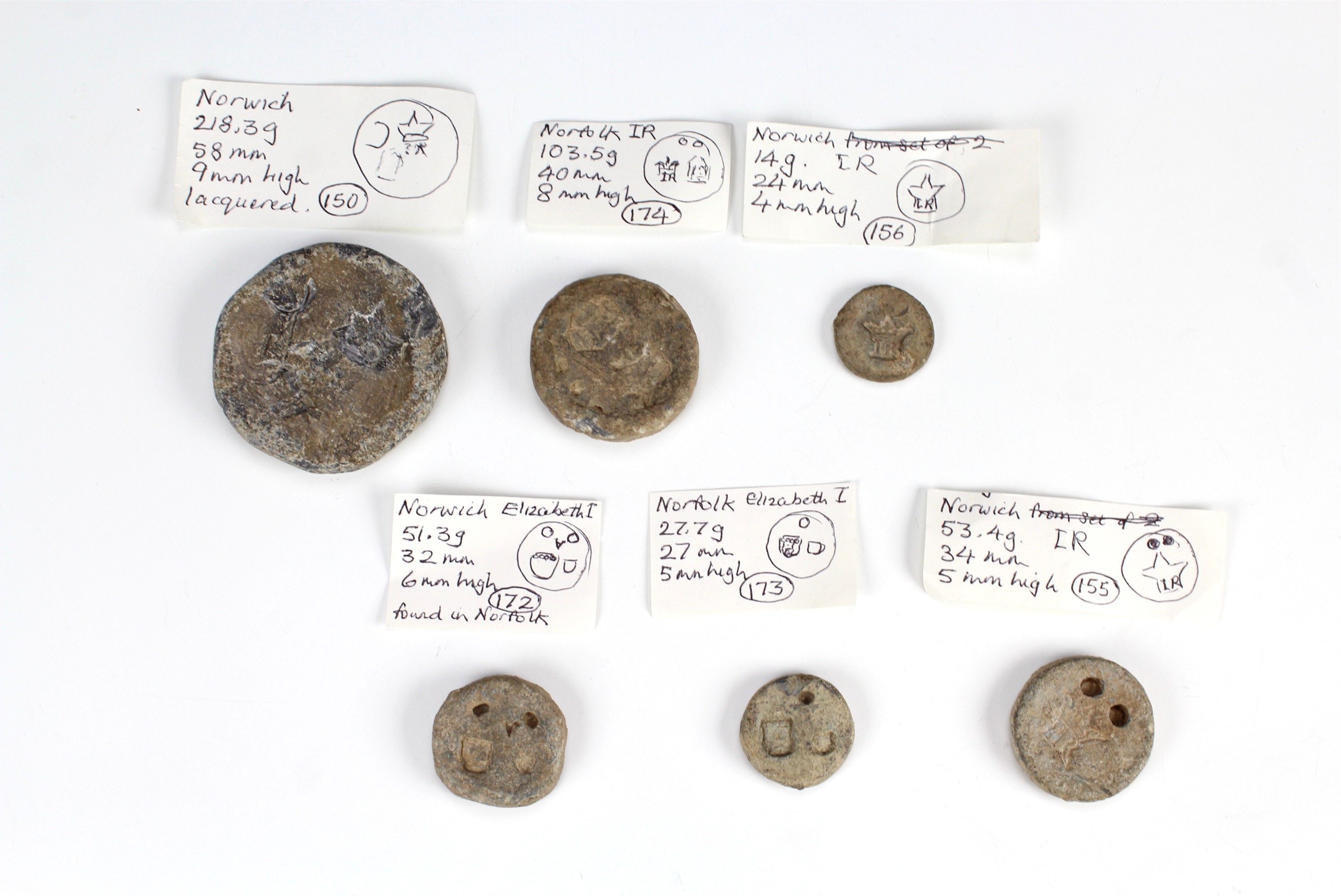 Six Medieval and later disc form lead trade weights relating to Norwich, variously marked