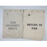 A "Her Britannic Majesty's Diplomatic Service" mail bag and one other similar