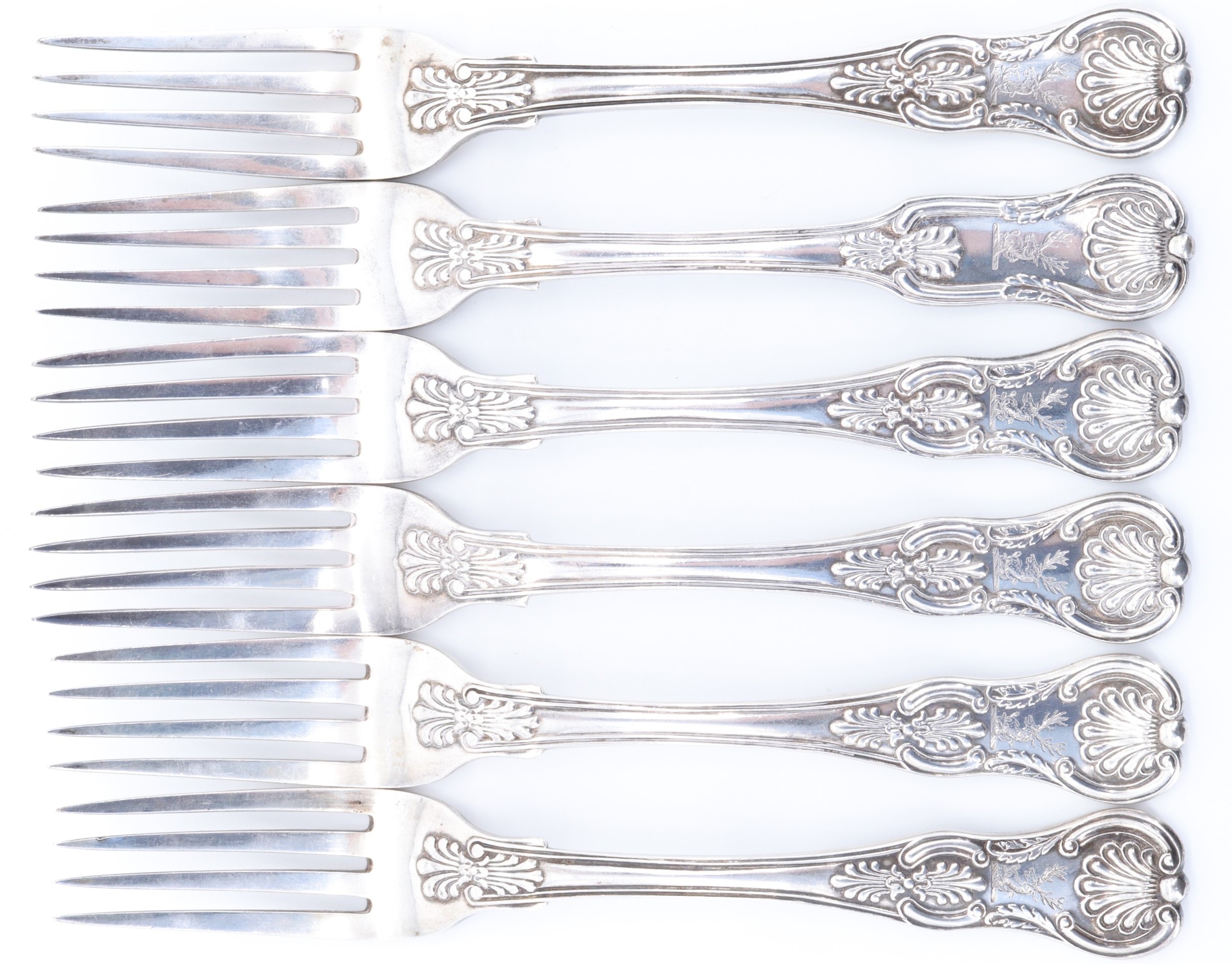 A set of five late Georgian silver Queen's pattern table forks, W E, London, 1824, together with
