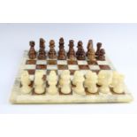 A "Regal" polished Italian alabaster chess set, the Kings 7.5 cm, including an alabaster chess