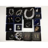 16 items of 21st Century "Butler and Wilson" costume jewellery in original boxes, comprising of