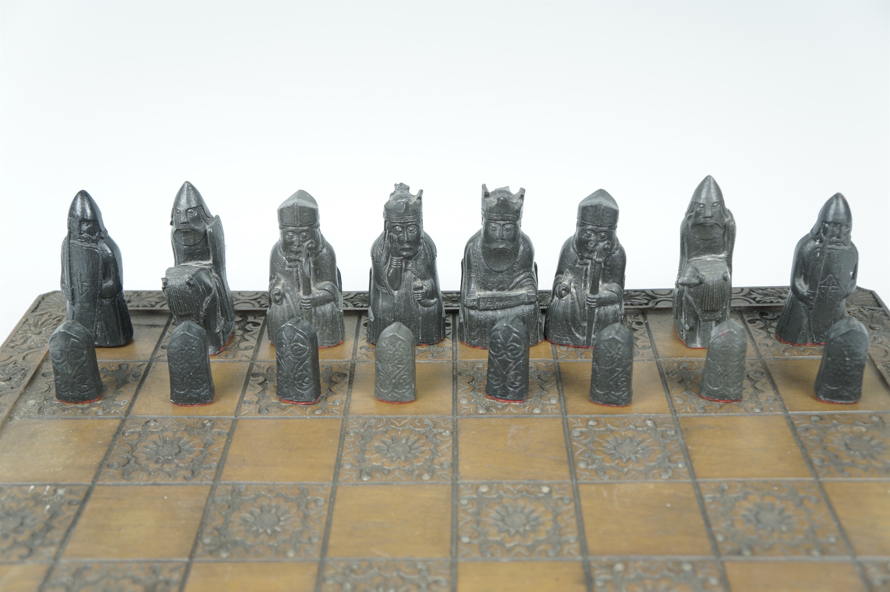 A vintage carved wood chess board, together with a set of Lewis style chess pieces, and one other - Image 4 of 8