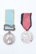 A Crimea Medal with Sebastopol clasp, together with a Turkish Crimea medal to Lieut C DEM Pritchard,