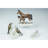 A Karl Ens chaffinch figurine, 15 cm together with a Nao figurine and horse figurine