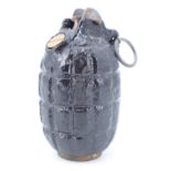 An inert relic 1915 British No 5 (Mills) grenade