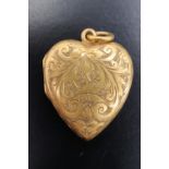 An Edwardian 15 ct gold heart-shaped pendant double locket, 2.5 cm, 5 g