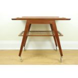 A mid-Century Scandinavian modern teak low etager drinks or tea trolley in the manner of Poul Jensen