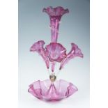 A Victorian cranberry glass epergne, 50 cm high, bowl, (a/f)