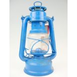 A new-old-stock Feuer Hand hurricane lamp, 25 cm excluding handles