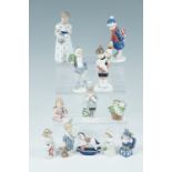 Twelve Royal Copenhagen figurines including boy with puppy, rocking horse etc