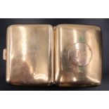 An Edwardian 9 ct gold cigarette case, 73 g, (catch a/f)