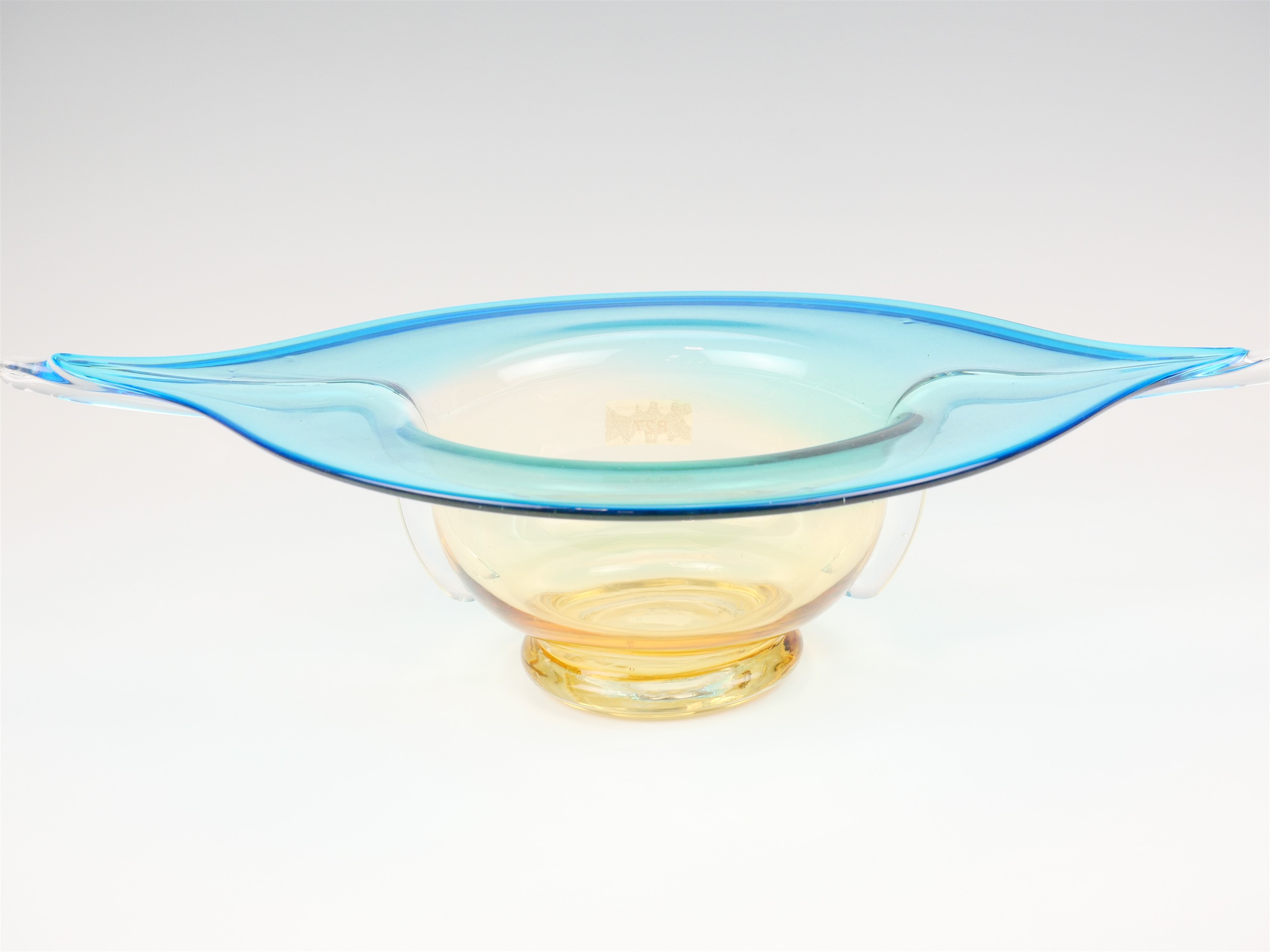 A large studio free-blown glass table centrepiece, of organic form, its pale amber body having a - Image 2 of 2