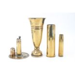 A Second World War trench art table cigarette lighter together with a 1943 trench art vase and inert