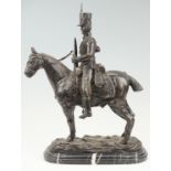 After J. R. Skeaping A cast bronze figure of a mounted Napoleonic cavalry hussar on a naturalistic