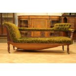 A late Victorian upholstered and carved mahogany salon suite comprising a chaise longue, four