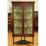 A George III astragal glazed mahogany corner cabinet