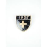 A 1927 Scottish University Exhibition badge, verso marked "W. L. Thomson, Glasgow, 1846"