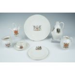 Eight items of early 20th Century crested china, including a plate, plate 24.5 cm diameter