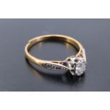 A diamond solitaire ring, comprising a brilliant cut stone of approx 0.2 ct crown set on an 18 ct