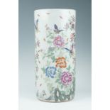 A 20th Century Chinese ceramic stick / umbrella stand, of cylindrical form and having famile rose