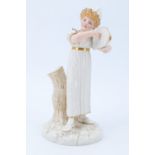 A late 19th Century Royal Worcester figure of a maiden with a tambourine, impress and underglaze