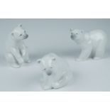 Three Lladro polar bears, tallest 12 cm
